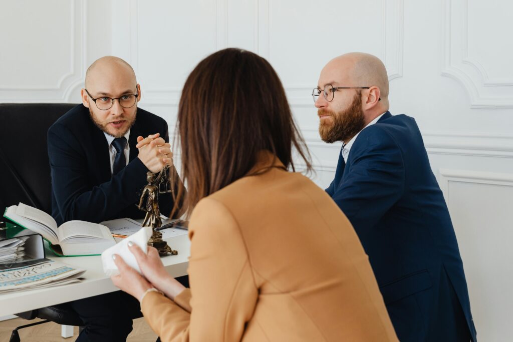 Marketing team discussing performance results and leadership strategies in a professional setting